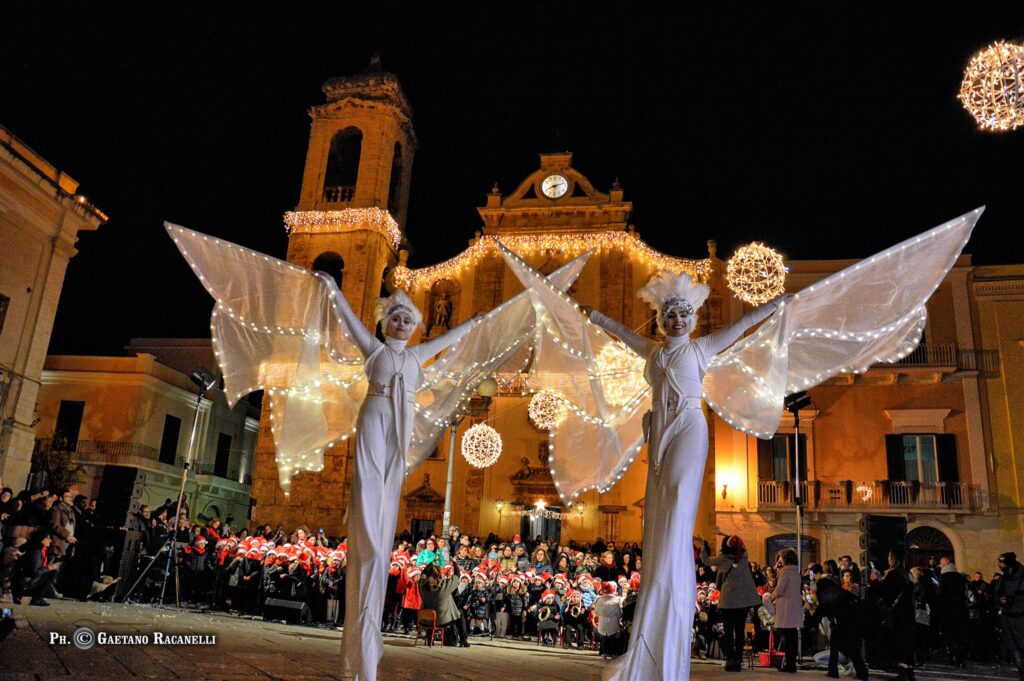Spettacolo farfalle luminose sui trampoli, eventi pubblici, matrimonio, artisti di strada, Lecce, Brindisi, Taranto.